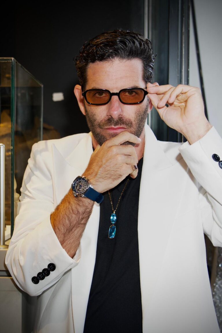 Fashion producer Nicolás Freijo trying on the latest from ive joyas